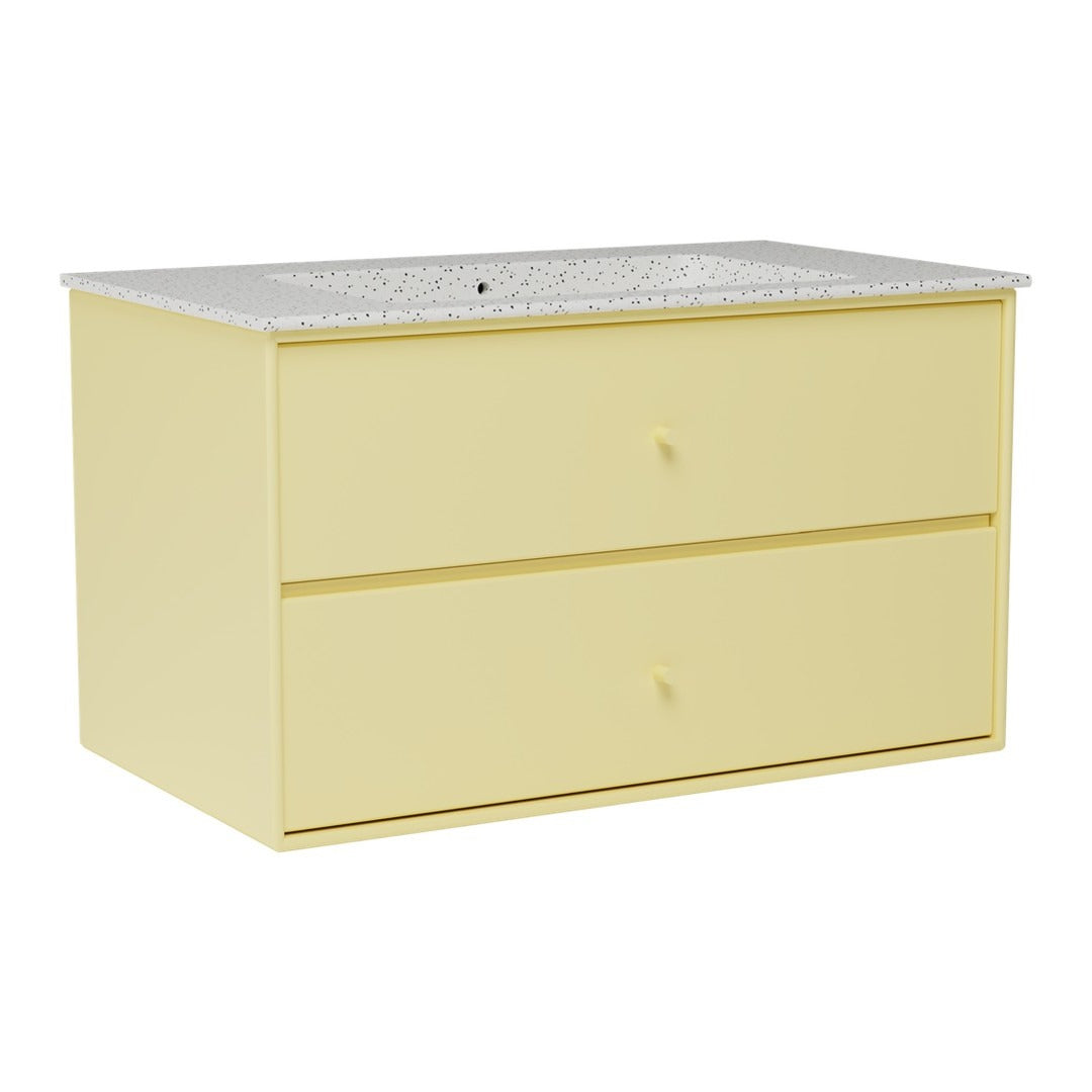 Yellow two-drawer dresser with a textured white countertop and smooth surfaces, perfect for modern spaces.