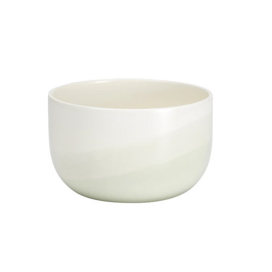 Ceramic bowl with a smooth, gradient ombre pattern in soft green and cream colors. Elegant and minimalist design.