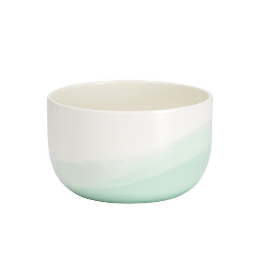 Ceramic bowl in white with a soft mint green gradient pattern. Perfect for stylish dining or home decor.