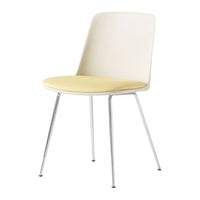 "Stylish white chair with a soft yellow seat and sleek chrome legs, perfect for modern decor."