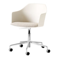 White ergonomic chair with a beige cushioned seat and a sleek chrome base on wheels. Modern, minimalistic design.