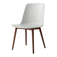 Stylish white chair with smooth finish and natural wood legs, perfect for modern and minimalist decor.