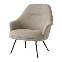 Light beige upholstered chair with smooth fabric and sleek black legs, perfect for modern decor.