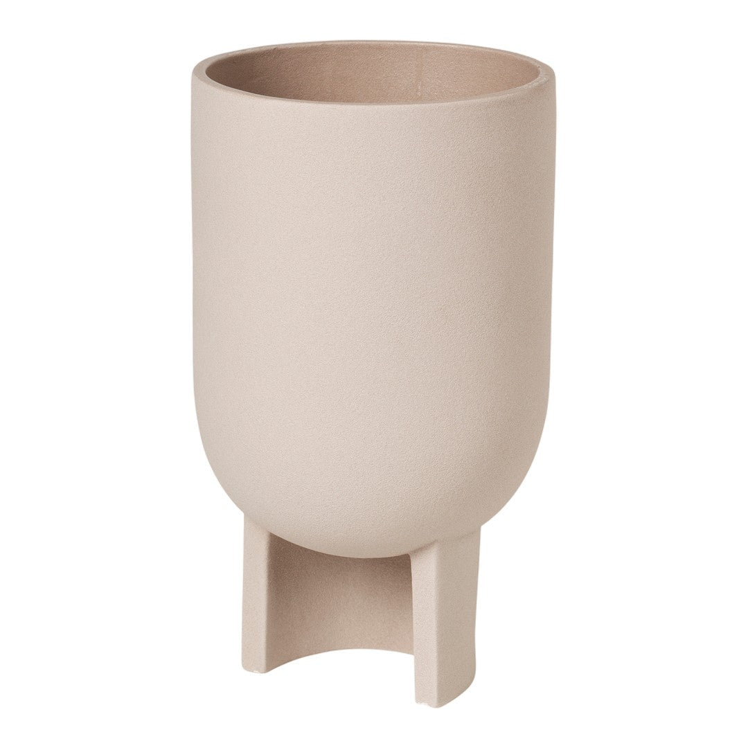 Light beige ceramic planter with a smooth finish and minimalist design, featuring a sturdy base. Perfect for modern decor.