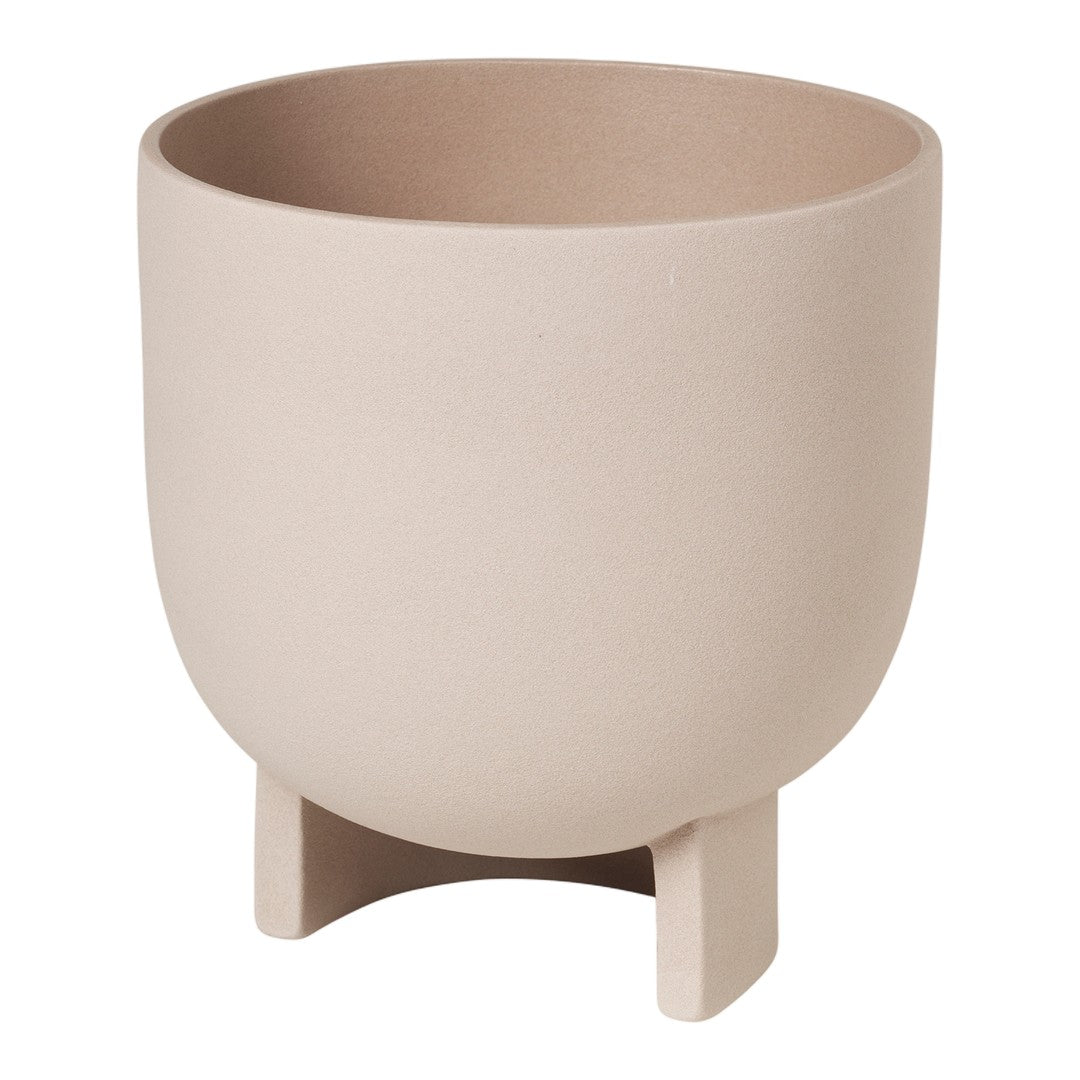 Round beige ceramic planter with a smooth matte finish and sturdy footed base. Ideal for modern decor.