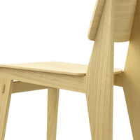 Light natural wood chair with smooth finish and minimalist design, showcasing elegant lines and subtle grain patterns.