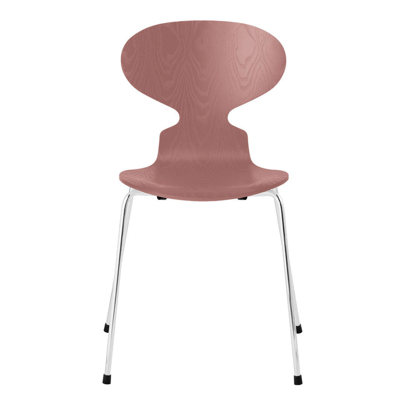 Rose pink chair with a smooth, curved design and chrome legs, showcasing a minimalist aesthetic.