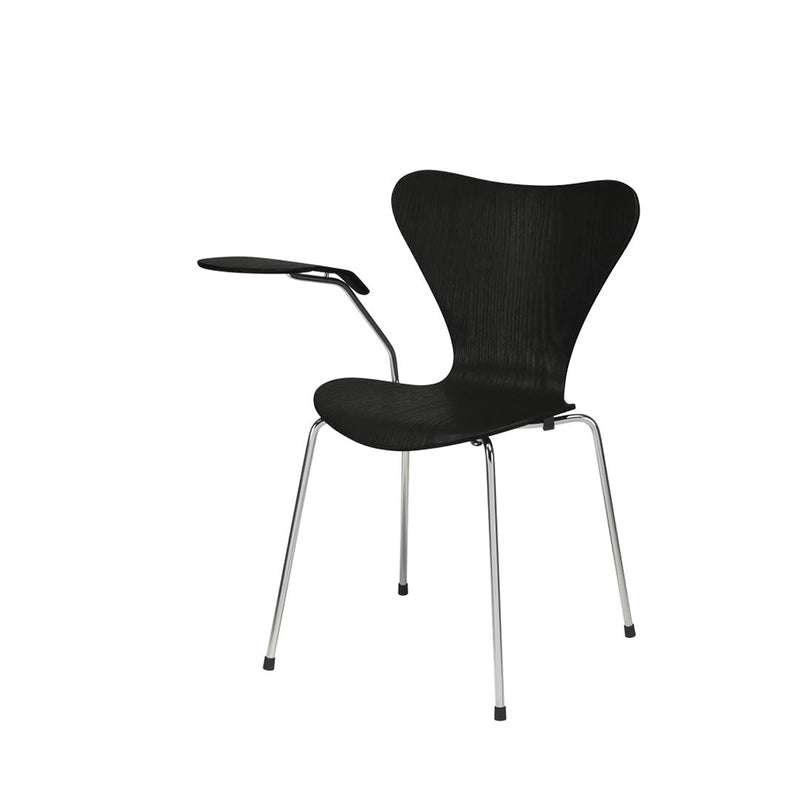 Black chair with a sleek, curved design and a chrome base, featuring a textured mesh pattern.