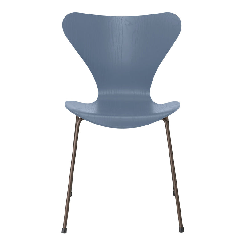 Gray modern chair with a unique butterfly shape and sleek metal legs, perfect for contemporary decor.