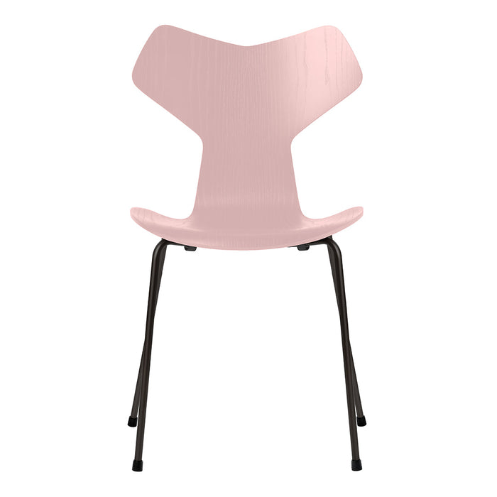 Modern pink chair with a sleek design and black metal legs, perfect for stylish interiors.