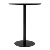 Black round bar table with a sleek, minimalist design and smooth surface, featuring a sturdy cylindrical base.