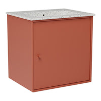 Rust-colored cabinet with a speckled white top and a simple design, perfect for modern decor.