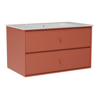 Rust-colored cabinet with a textured white speckled top and two spacious drawers. Modern, sleek design perfect for any space.