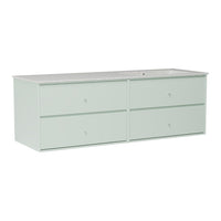 Soft green dresser with four spacious drawers and a sleek, minimalist design. Ideal for modern decor.