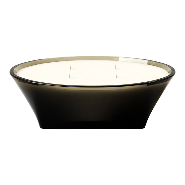 Black and translucent green candle holder with a smooth, glossy finish and a cream wax top.