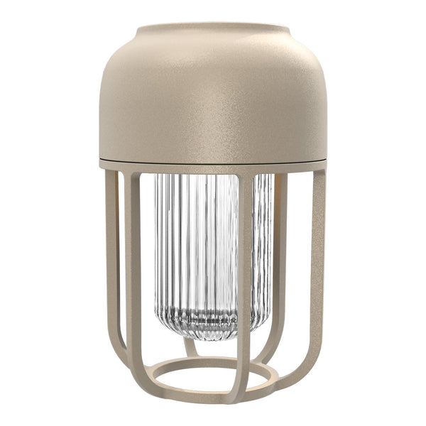 Beige lamp with a clear glass shade, featuring a minimalist design and an open metal cage pattern.
