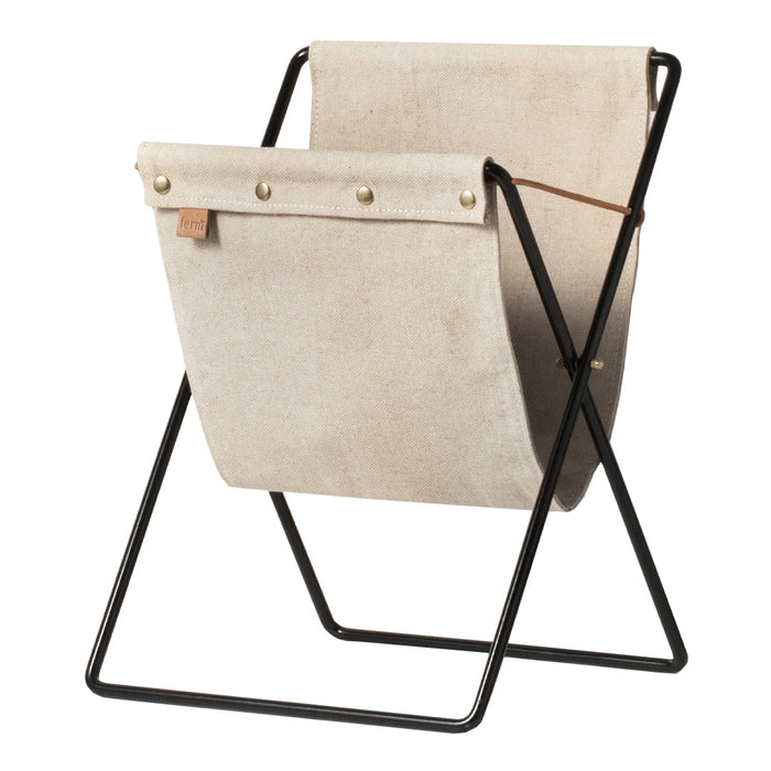 Beige fabric chair with black metal frame and brass studs, featuring a minimalist design and clean lines.