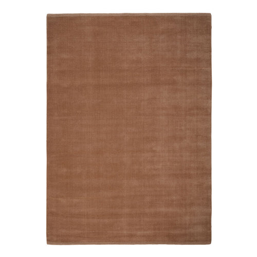 Solid brown area rug with a smooth texture, perfect for adding warmth and elegance to any space.