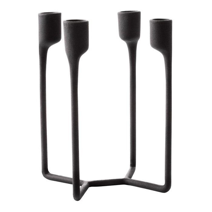 Black metal candle holder with a minimalist design and sleek, smooth finish. Ideal for modern decor.