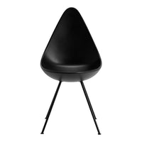 Black teardrop chair with a smooth finish and slender black legs, ideal for modern and minimalist decor.