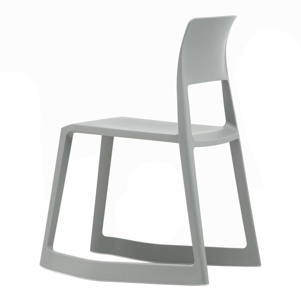 Gray modern chair with a minimalist design and smooth finish, featuring a sleek, angular silhouette.