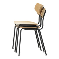 Stack of three modern chairs featuring a light wood seat and backrest with sleek black metal frames.