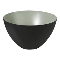 Black exterior bowl with a smooth, matte finish and a contrasting light green interior. Modern design with sleek lines.