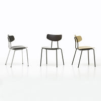 Collection of three minimalist chairs in black, brown, and light beige, featuring sleek, simple designs.