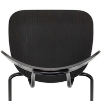 Sleek black chair back with smooth curves and subtle wood grain pattern, modern design aesthetics.
