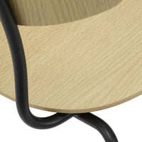 Light wood grain with black metal accents, featuring a smooth, circular pattern and sleek lines. Perfect for modern decor.