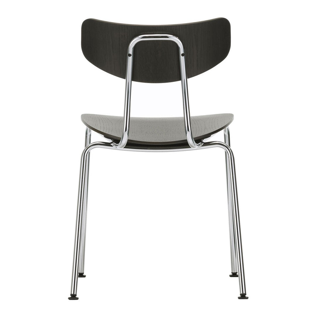 Black wooden chair with chrome legs and a minimalist design, featuring a smooth, modern finish.
