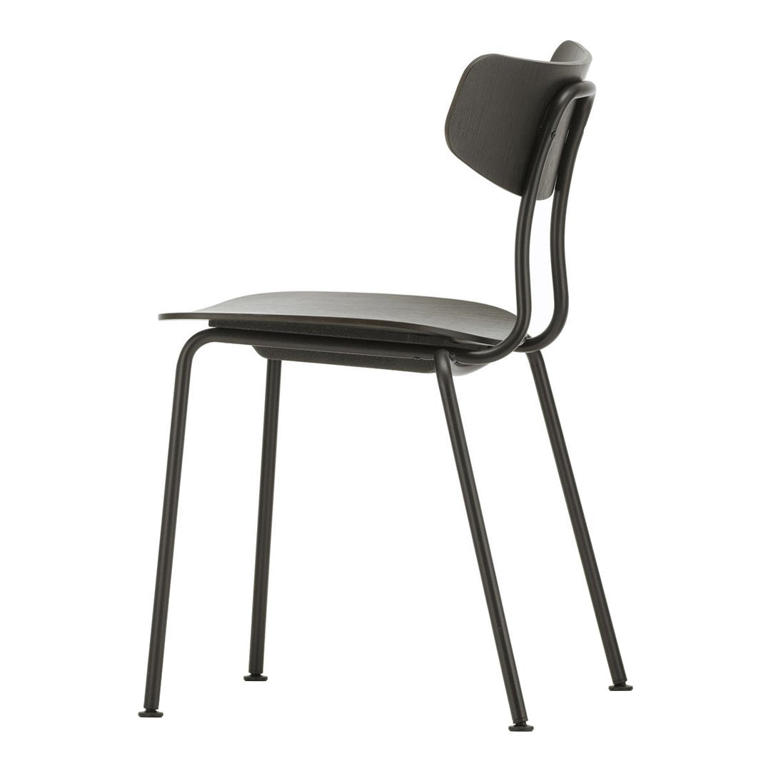 Simple black chair with a smooth, matte finish and minimalist design. Versatile for modern decor.