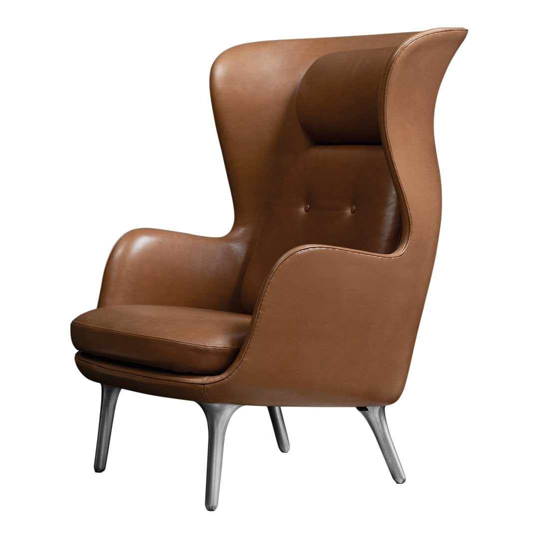 Brown leather armchair with a smooth finish and sleek, modern design. Features a high back and silver legs.