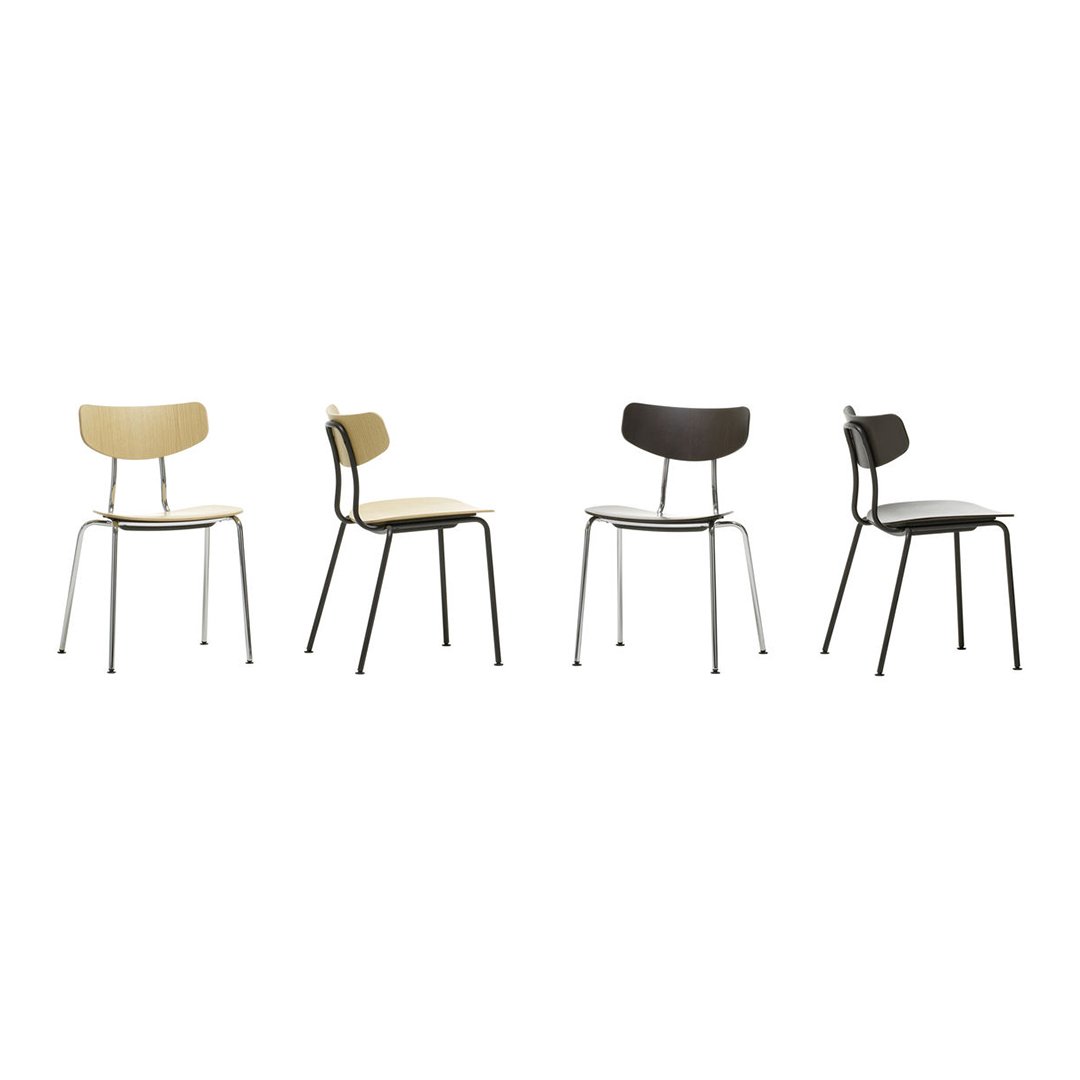 Set of four minimalist chairs in beige, taupe, black, and dark brown with sleek metal legs and smooth finishes.