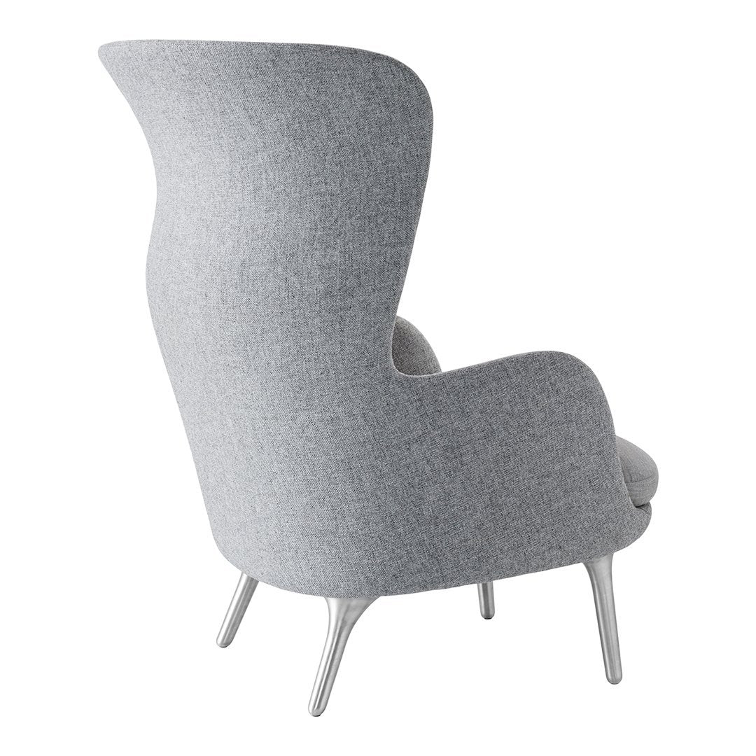 Gray upholstered chair with a smooth texture and elegant, minimalist design, featuring tapered light wood legs.