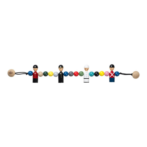 Colorful wooden bead toy featuring red, black, blue, yellow, and white patterns with playful character designs.