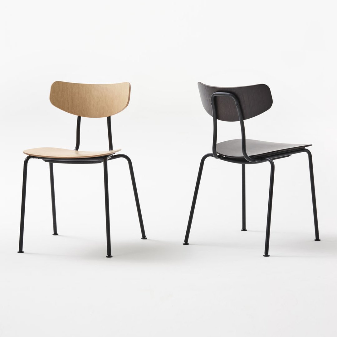 "Wooden chairs in natural beige and black finish, featuring sleek metal legs and modern design."