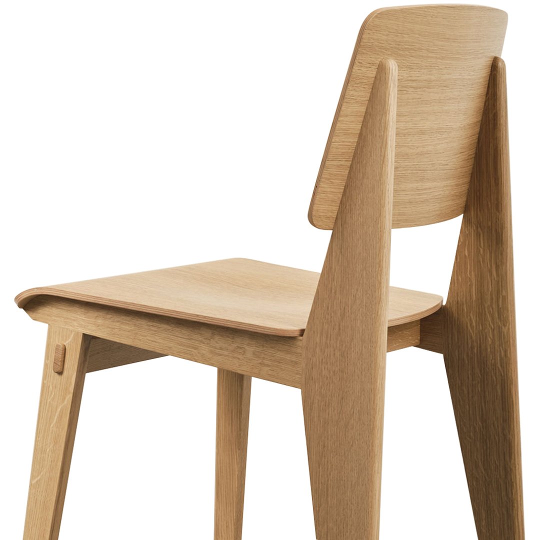 Light oak wooden chair with a smooth finish and sleek, minimalist design. Perfect for modern decor.