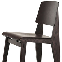 Dark brown wooden chair with a sleek, minimalist design and smooth, clean lines. Ideal for modern decor.