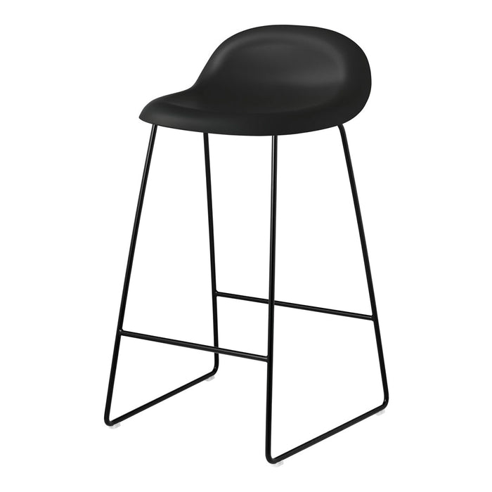 Black bar stool with a sleek, minimalist design and a smooth, matte finish. Stylish black metal legs complement the seat.