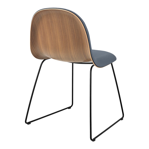 Modern chair featuring a warm wood backrest and sleek gray seat on black metal legs. Perfect for contemporary decor.