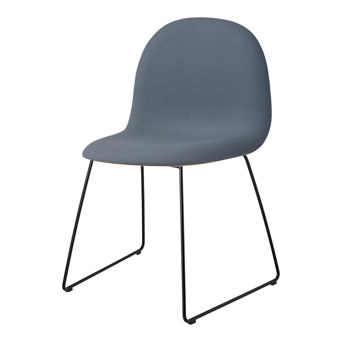 Gray ergonomic chair with a smooth texture and sleek black metal legs. Perfect for modern interior decor.