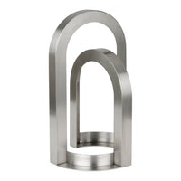 Sleek silver stainless steel sculpture with smooth, curved arches and a minimalist design. Perfect for modern decor.