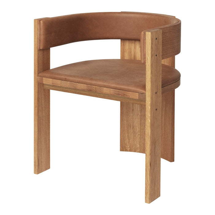 Tan leather chair with a smooth wooden frame, featuring a minimalist curved design and natural wood tones.