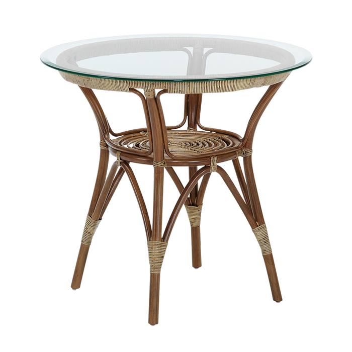 Round rattan side table with a natural brown finish and a clear glass top, featuring woven accents and an elegant design.