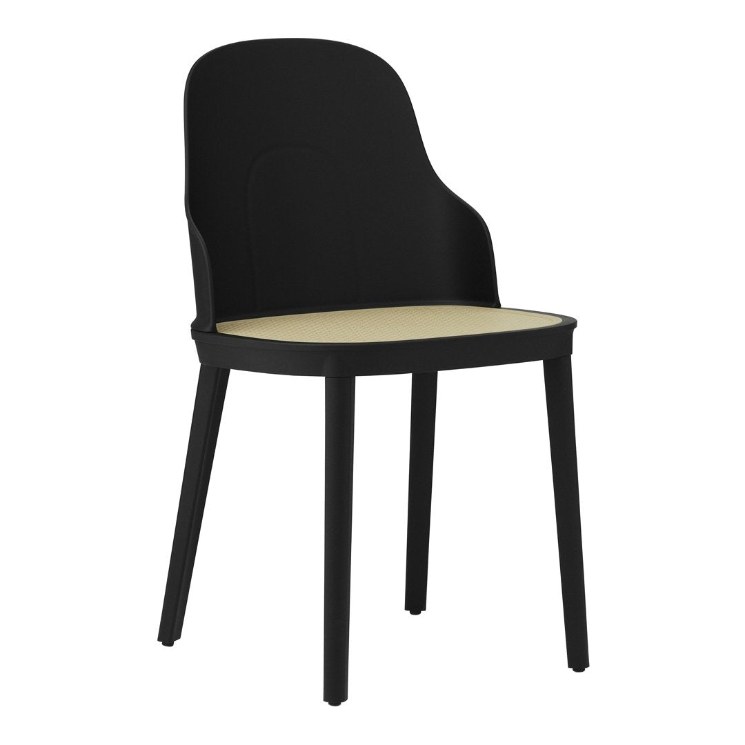 Black chair with a smooth, minimalist design featuring a light beige seat. Ideal for modern decor.