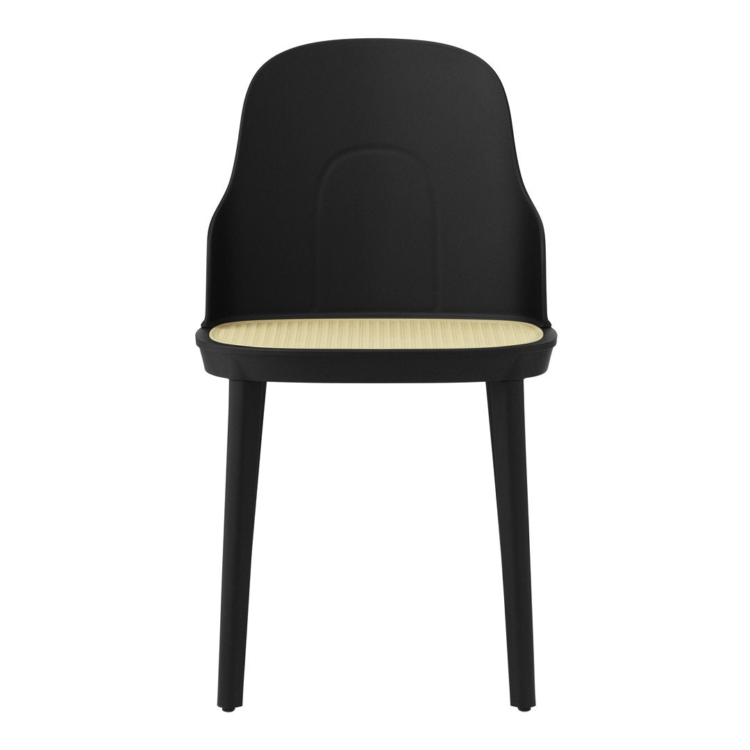 Black chair with a woven beige seat, featuring a smooth, modern design and minimalist aesthetic.