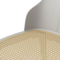 Neutral white chair with a textured beige woven seat pattern, perfect for modern minimalistic interiors.