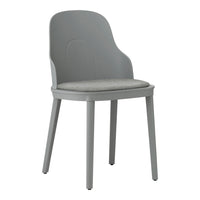 Light gray chair with a smooth seat and simple, modern design, featuring a subtle textured fabric cushion.