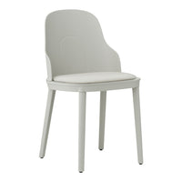 Modern white dining chair with sleek design and smooth, matte finish. Simple and elegant for any decor.